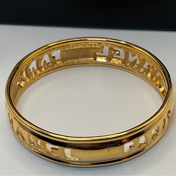 CHANEL Gold Cut Out Logo Bangle - Picture 8 of 10